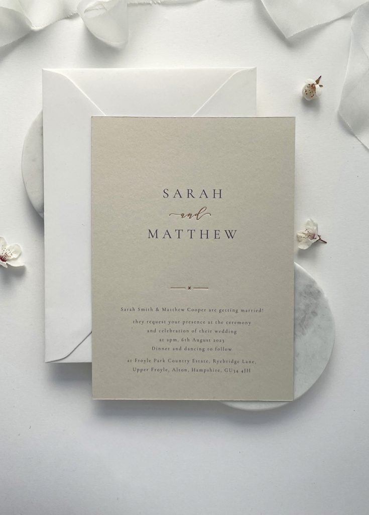 The Gold Foil Calligraphy Wedding Stationery Collection showcases elegant handwritten calligraphy and luxurious gold foil detailing. Perfect for modern couples, this collection offers timeless invitations with a beautifully minimalist feel. Perfect for any wedding theme – available in four colours: white, ivory, nude and pale grey.
