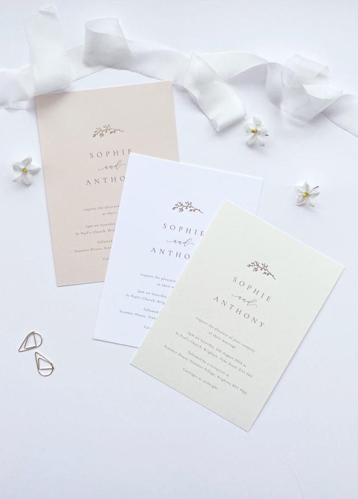 Luxury gold foil wedding invitation with a minimal floral illustration in gold foil and timeless simple type, available in white, blush pink and ivory
