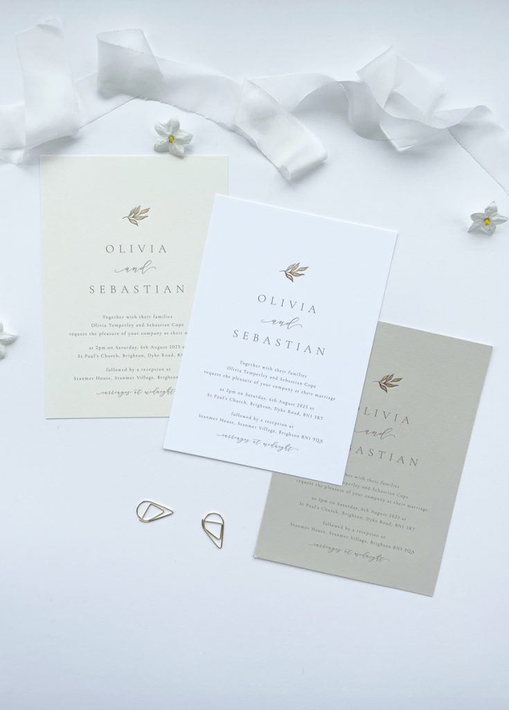 Luxury wedding invitation with a gold foil elegant leaf and modern type, perfect for contemporary weddings available on white, ivory and nude card