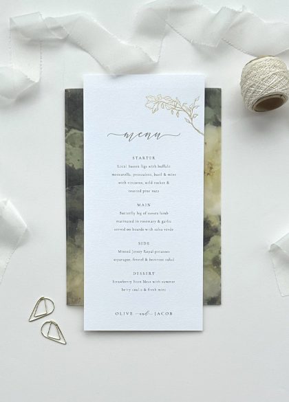 Luxury gold foil rose wedding menu printed on premium white card featuring an elegant floral design and minimalist typography.