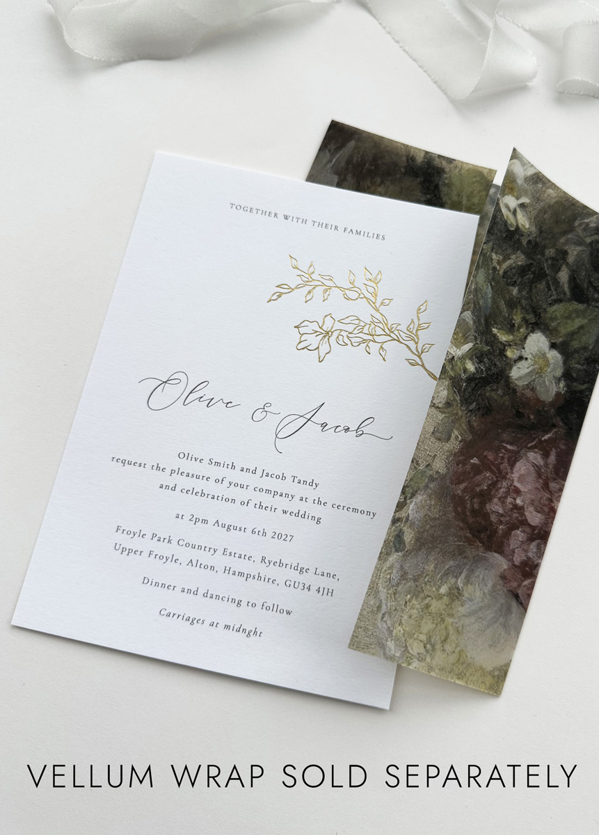Minimalist gold foil wedding invitation set with soft floral envelope, perfect for timeless and elegant weddings.