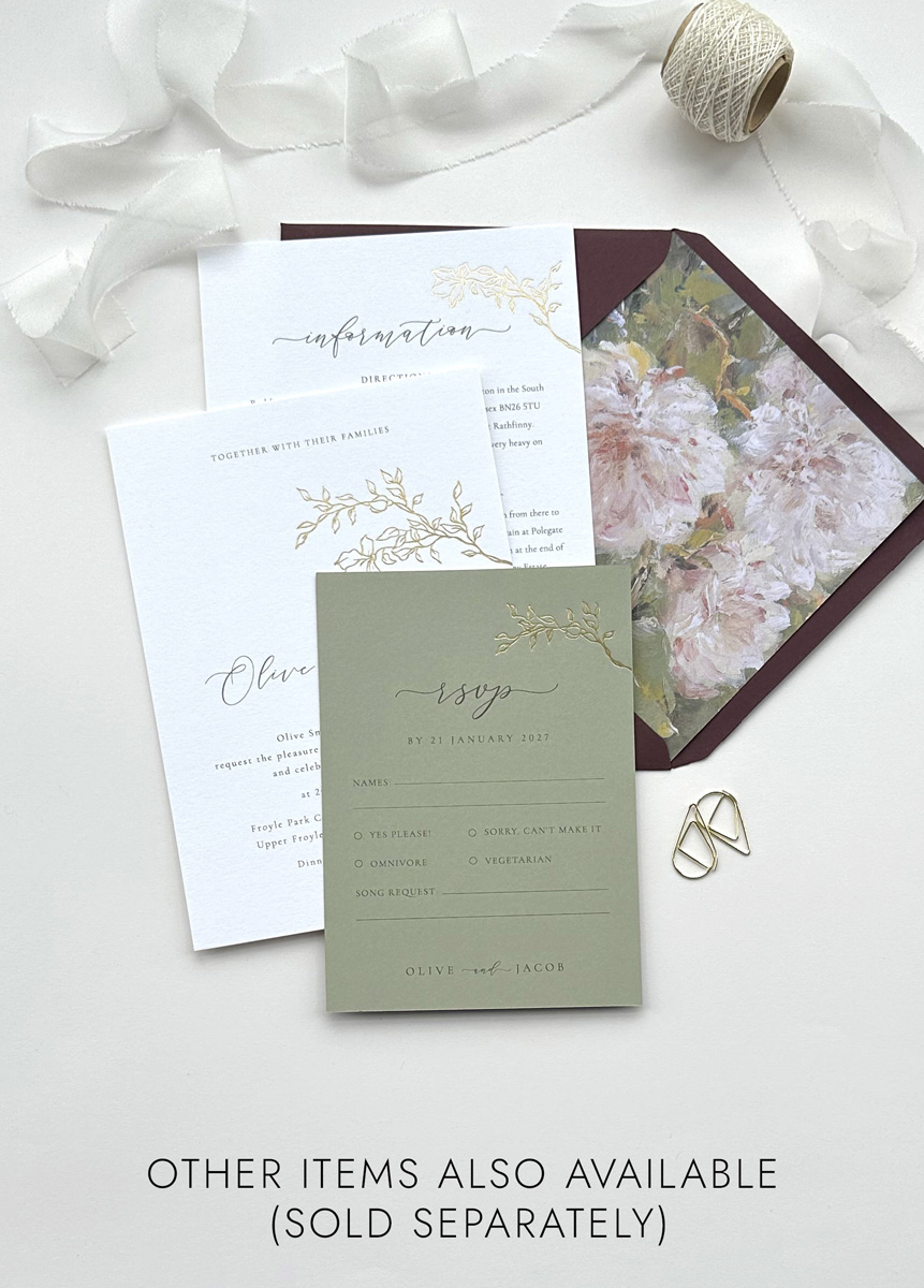 Elegant botanical wedding invitation with gold foil leaf design and floral envelope, modern minimalist stationery.