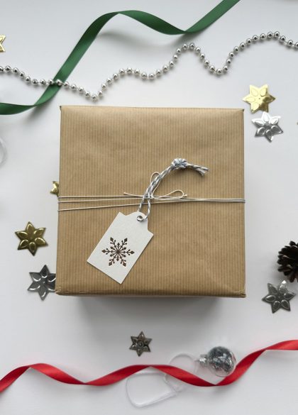 Handmade Christmas tag with metallic gold foil snowflake design