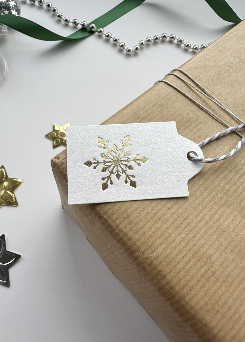Premium handmade festive tag with snowflake design