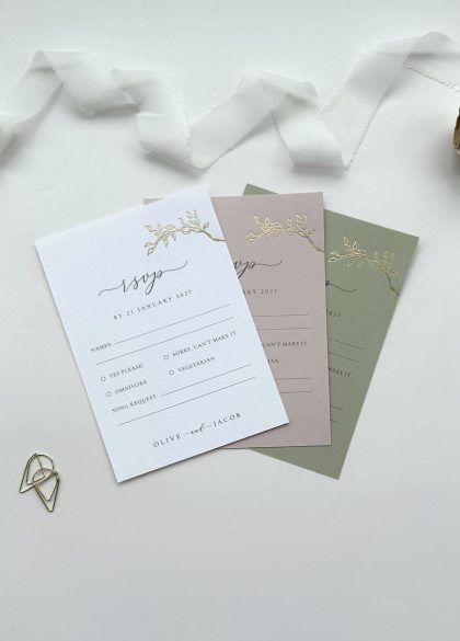 Gold foil wedding RSVP insert with botanical floral illustration and elegant fine art wedding suite aesthetic