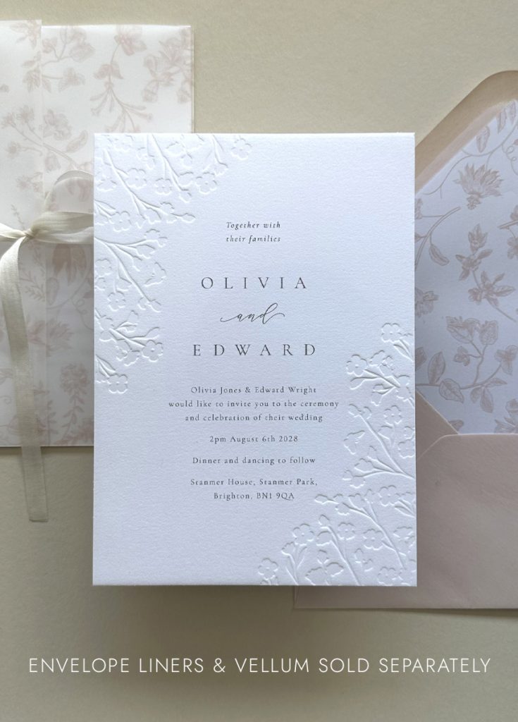 Luxury floral embossed wedding invitation suite printed on thick cotton card with matching RSVP card, details card and floral lined envelope.