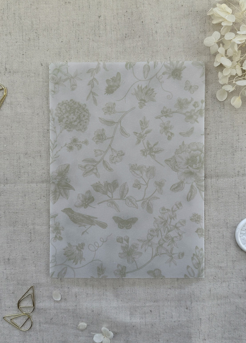 Vintage floral vellum jacket designed to hold wedding invitations, RSVP cards and details cards in a coordinated suite.